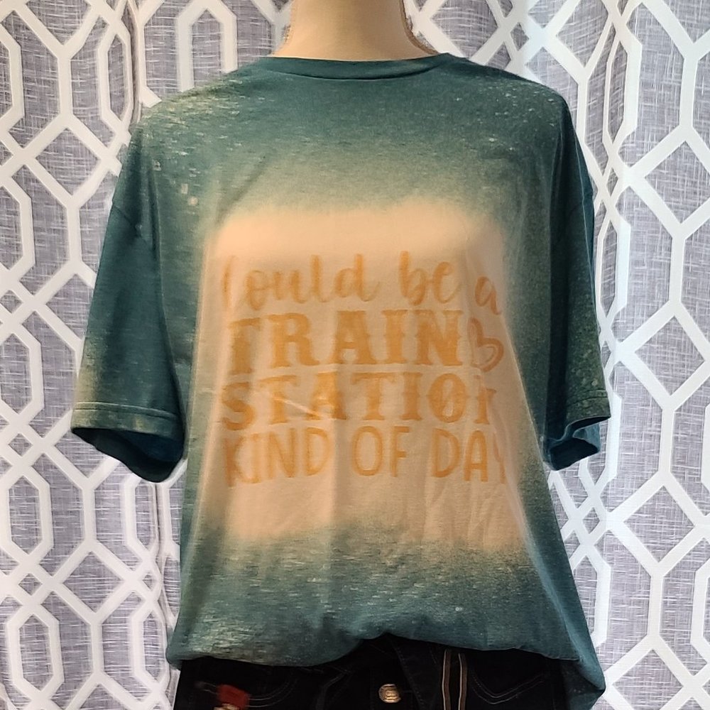 Women's distressed tee. Teal Color